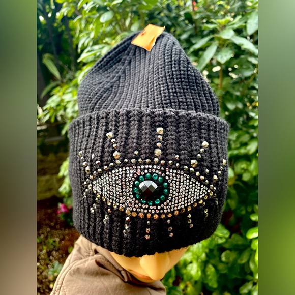 Black Beanie with Eye Design by Kurt Geiger.
NWOT - Picture 3 of 17